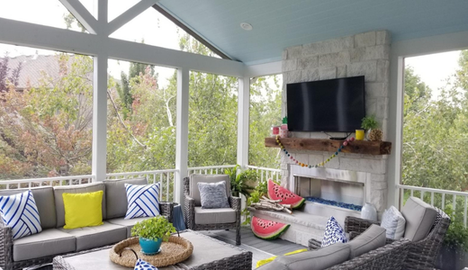 Screened porch with comfortable furniture in Shawnee, Kansas